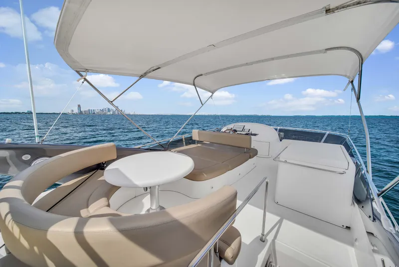 Slide: The Image of 2006 Uniesse 58 yacht with spacious deck and ocean view. - 39