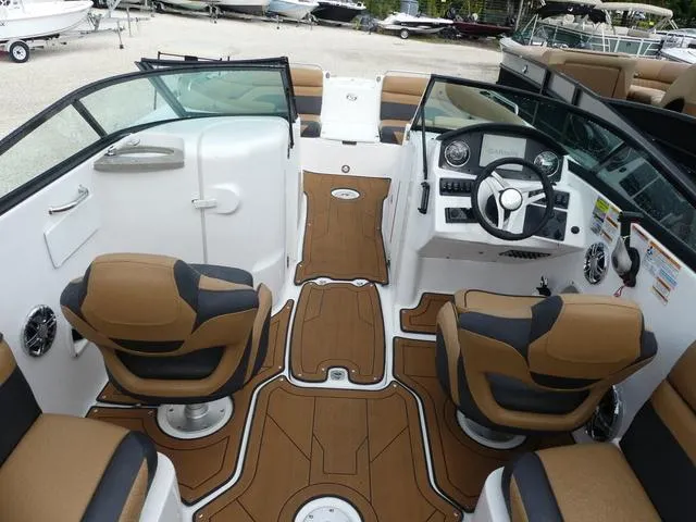 Slide: The Image of 2024 Hurricane SunDeck 2486 OB boat dashboard with Garmin navigation system. - 10