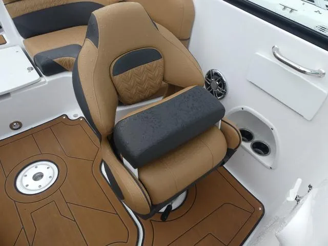 Slide: The Image of 2024 Hurricane SunDeck 2486 OB boat interior with seating and storage. - 15