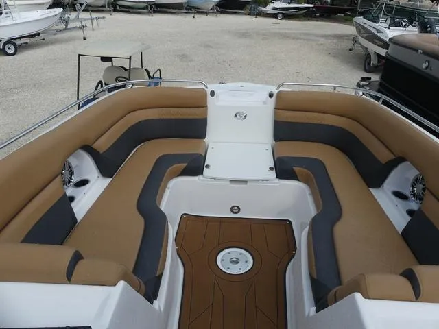 Slide: The Image of 2024 Hurricane SunDeck 2486 OB boat with tan and black seating. - 17
