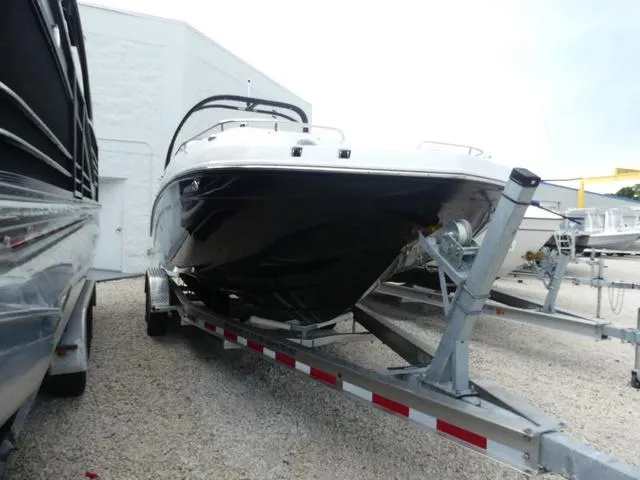 Slide: The Image of 2024 Hurricane SunDeck 2486 OB boat with Yamaha 250 outboard motor on trailer. - 4