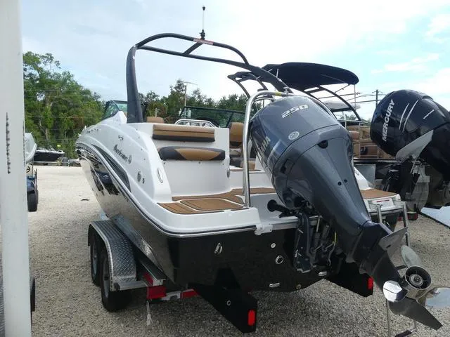 Slide: The Image of 2024 Hurricane SunDeck 2486 OB boat with outboard motor, rear view. - 5