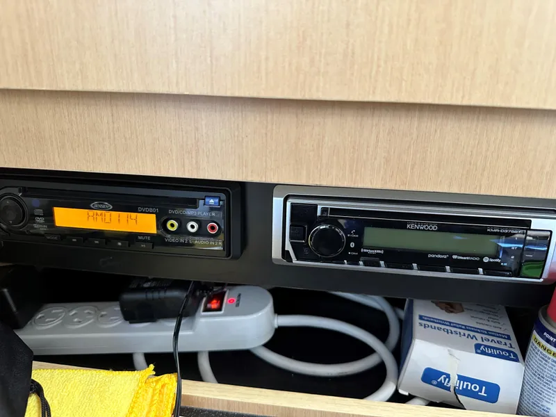 Slide: The Image of Audio system in a 2012 Bayliner 335 Cruiser boat. - 17