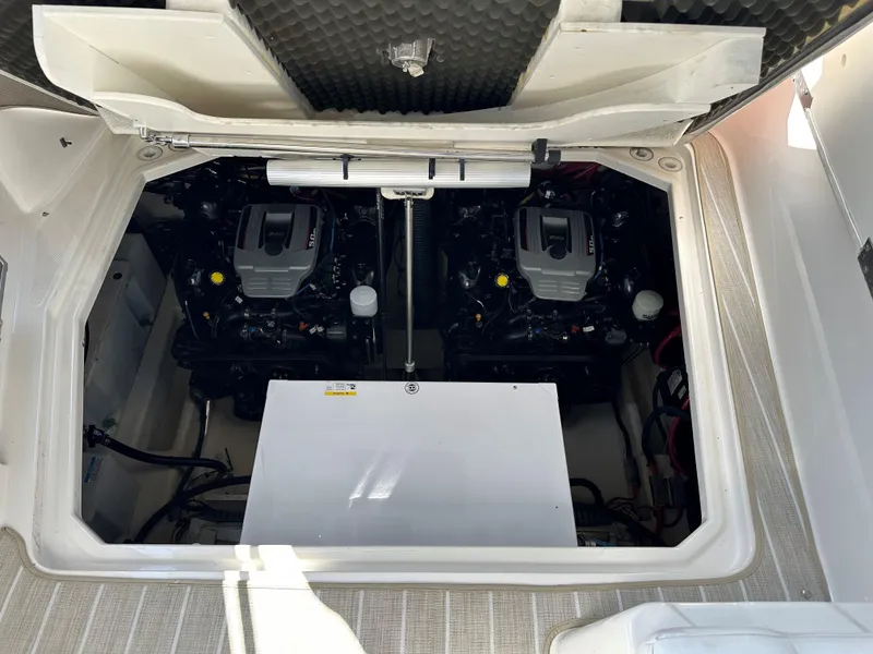 Slide: The Image of Engine compartment of a 2012 Bayliner 335 Cruiser with twin engines. - 21