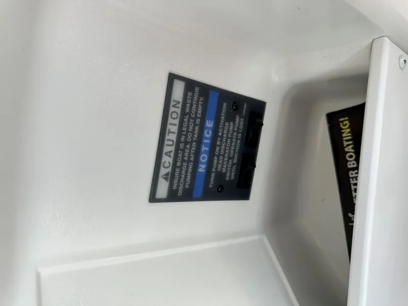 Slide: The Image of Caution and notice labels on 2012 Bayliner 335 Cruiser boat interior. - 22