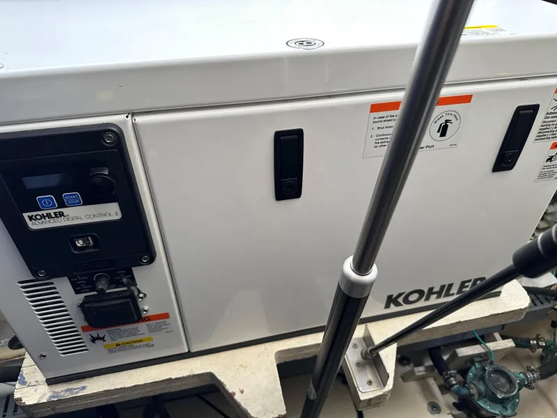 Slide: The Image of Kohler generator in a 2012 Bayliner 335 Cruiser boat. - 25