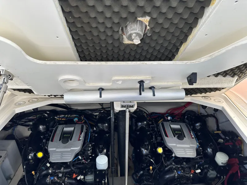 Slide: The Image of Engine compartment of a 2012 Bayliner 335 Cruiser with twin engines. - 28