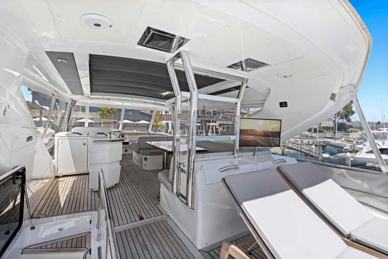 Slide: The Image of Luxurious 2015 Absolute 64 FLY yacht interior with modern design and spacious seating area. - 20