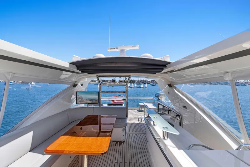 Slide: The Image of Luxurious 2015 Absolute 64 FLY yacht interior with ocean view and elegant seating area. - 27