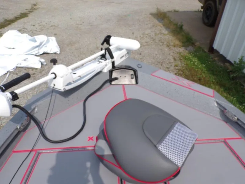 Slide: The Image of 2024 Xpress H190Bay boat with trolling motor and seat. - 13