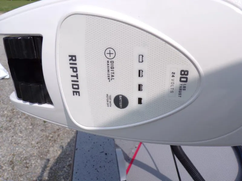 Slide: The Image of Close-up of Riptide motor on 2024 Xpress H190Bay boat. - 14