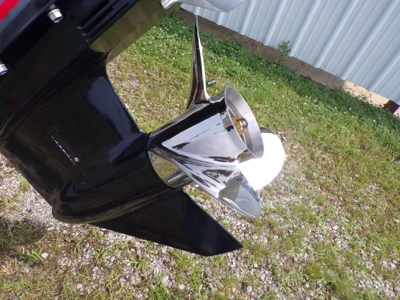 Slide: The Image of Close-up of 2024 Xpress H190Bay boat propeller on grass. - 18