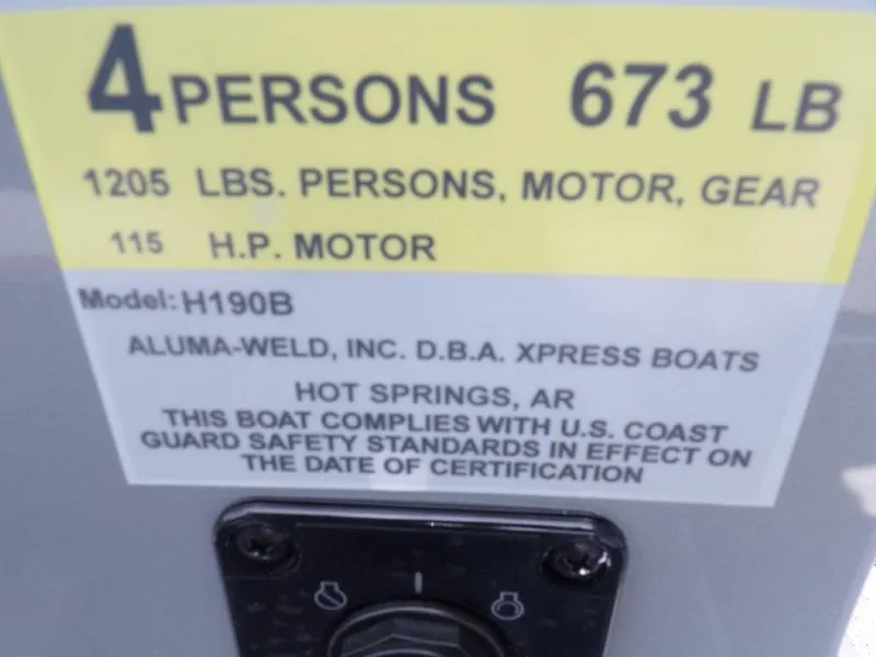 Slide: The Image of 2024 Xpress H190Bay boat capacity label, 4 persons, 673 lbs, 1205 lbs total, 115 HP motor - 2