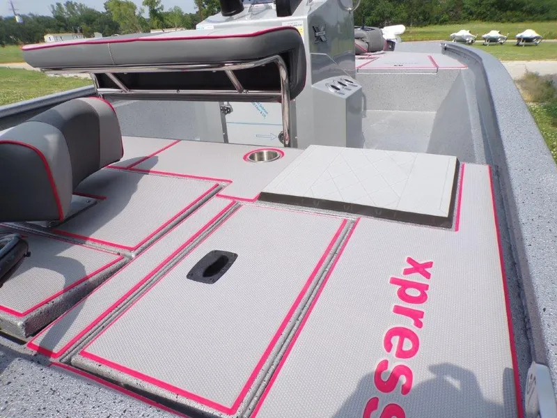 Slide: The Image of 2024 Xpress H190Bay boat interior with seating and storage compartments. - 3