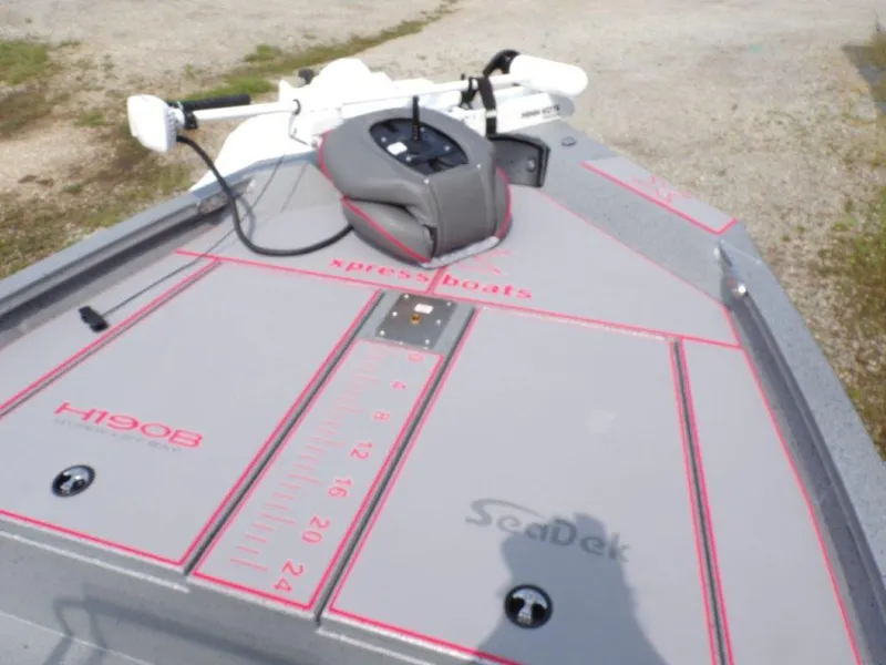 Slide: The Image of 2024 Xpress H190Bay boat deck with SeaDek flooring and measuring ruler. - 8