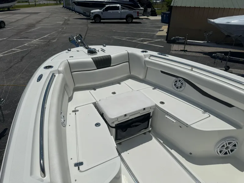 Slide: The Image of 2022 Wellcraft 262 Fisherman boat interior with seating and storage compartments. - 19