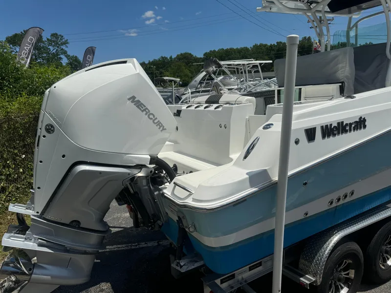 Slide: The Image of 2022 Wellcraft 262 Fisherman boat with Mercury outboard engine. - 20