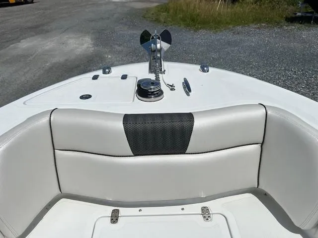 Slide: The Image of 2022 Wellcraft 262 Fisherman boat bow seating and anchor area. - 9