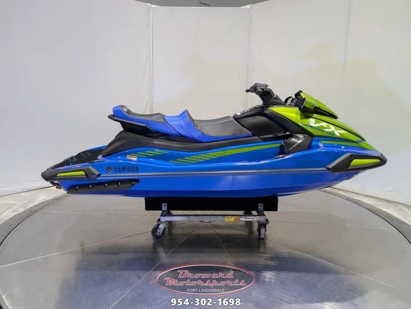 Slide: The Image of 2024 Yamaha Boats VX® Limited HO in blue and green on display. - 1