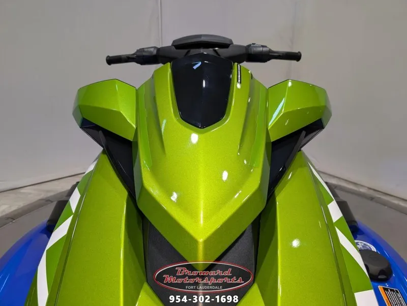 Slide: The Image of 2024 Yamaha Boats VX® Limited HO, green and blue jet ski, front view. - 12