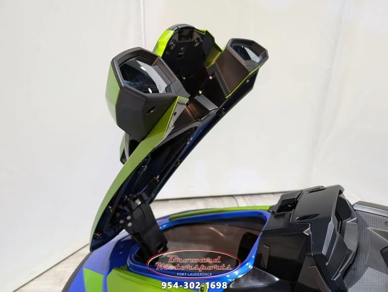 Slide: The Image of 2024 Yamaha Boats VX® Limited HO with open storage compartment, showcasing sleek design. - 17