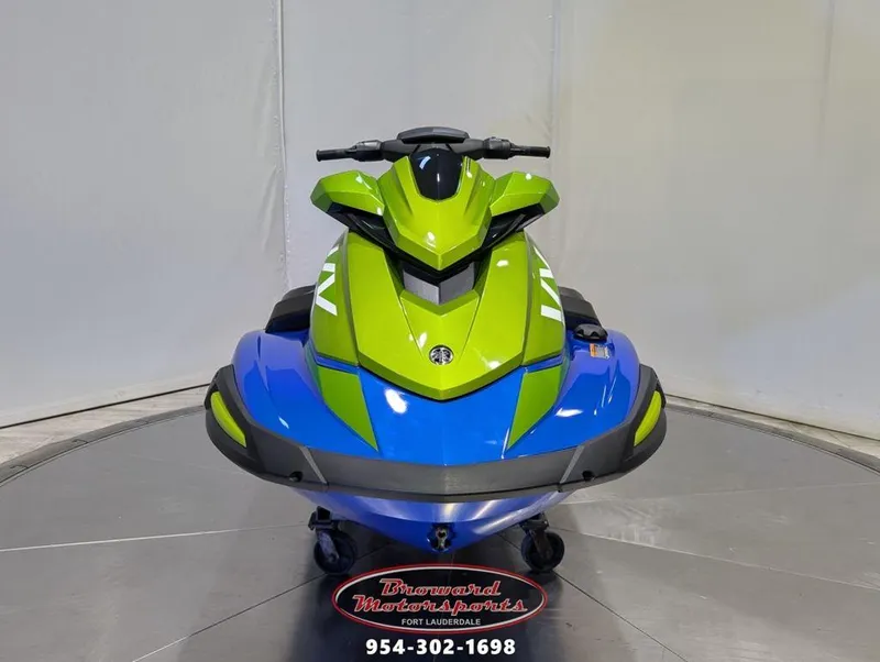 Slide: The Image of 2024 Yamaha Boats VX® Limited HO in vibrant green and blue, front view. - 2