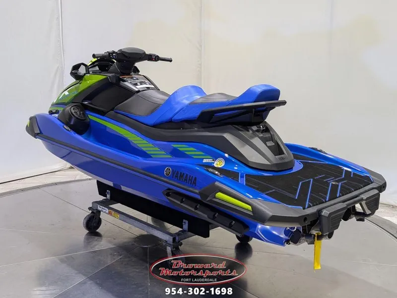 Slide: The Image of 2024 Yamaha Boats VX® Limited HO in blue and green on display. - 5
