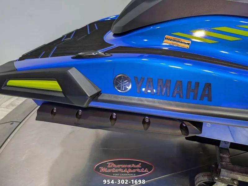 Slide: The Image of 2024 Yamaha VX® Limited HO jet ski, blue and black design, close-up view. - 8