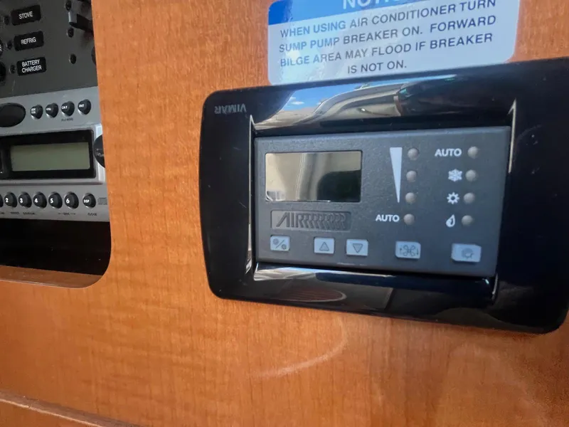 Slide: The Image of 2007 Chaparral Signature 280 control panel and air conditioning unit. - 15