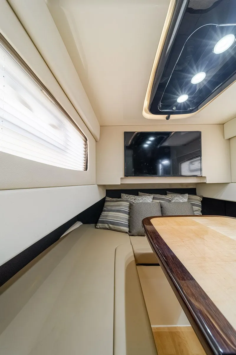 Slide: The Image of Luxurious interior of 2020 Scout 420 LXF yacht with seating and TV. - 28