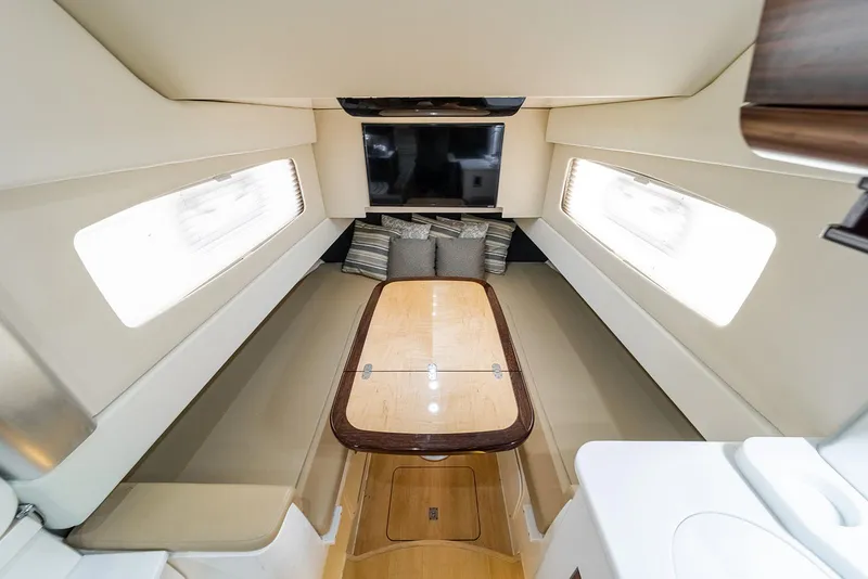 Slide: The Image of Luxurious interior of 2020 Scout 420 LXF yacht with elegant seating and table. - 29