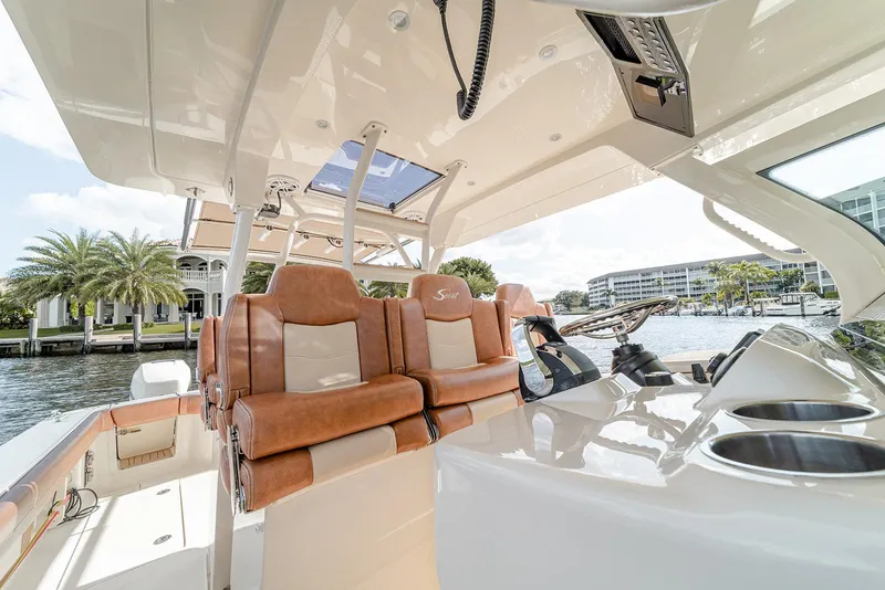 Slide: The Image of Luxurious interior of 2020 Scout 420 LXF boat with leather seating and modern amenities. - 48