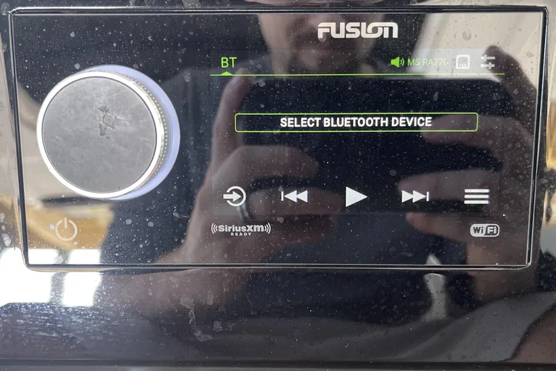 Slide: The Image of Fusion audio system interface on a 2022 Sea Ray SLX 400 boat. - 17