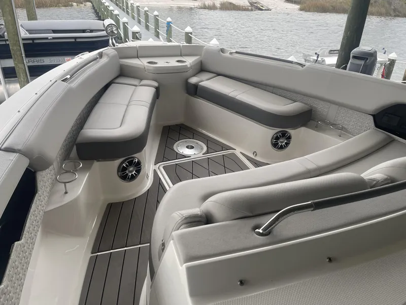 Slide: The Image of 2022 Sea Ray SLX 400 boat interior with spacious seating and modern design. - 4