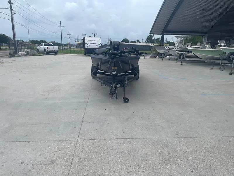 Slide: The Image of 2022 Ranger RT188 boat on trailer in outdoor lot. - 3