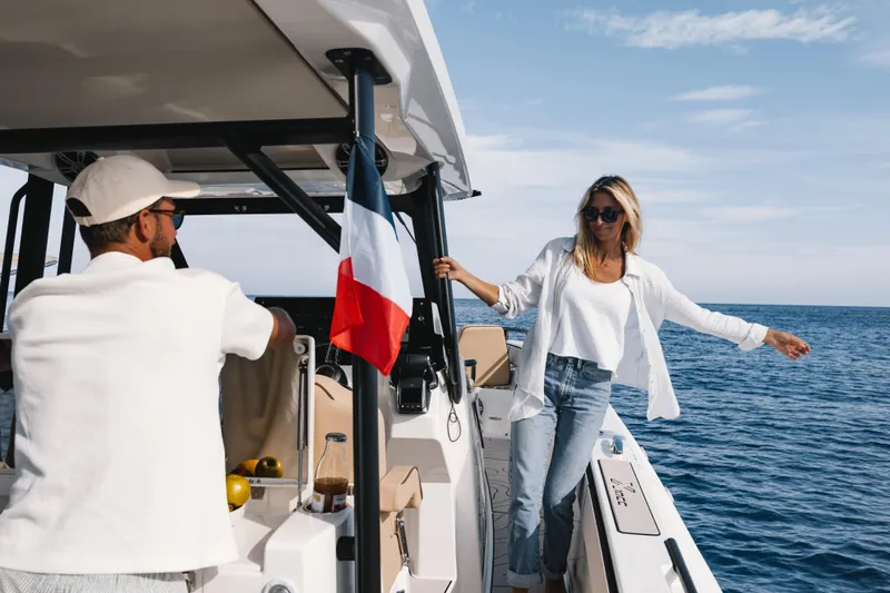 Slide: The Image of Two people enjoying a Zodiac X10CC boat ride on the ocean, 2025 model. - 3