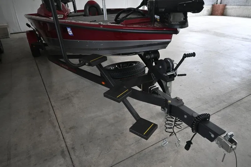 Slide: The Image of 2021 Vexus AVX1880 boat on trailer in a garage. - 5