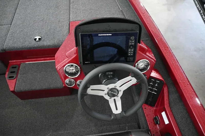 Slide: The Image of 2021 Vexus AVX1880 boat dashboard with steering wheel and electronic display. - 7
