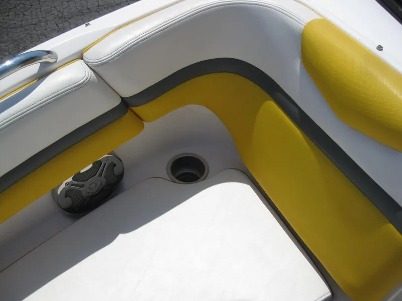 Slide: The Image of 2015 Chaparral 203 Vortex VRX boat interior with yellow and white seating. - 18