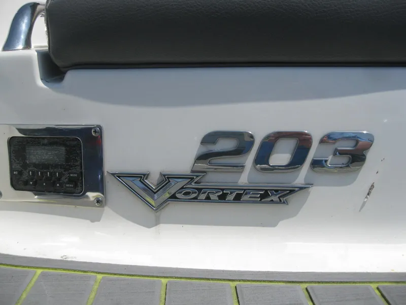 Slide: The Image of 2015 Chaparral 203 Vortex VRX boat emblem and control panel. - 4