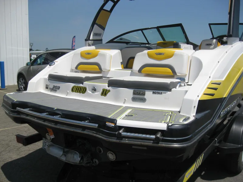 Slide: The Image of 2015 Chaparral 203 Vortex VRX boat rear view with yellow and white seating. - 5