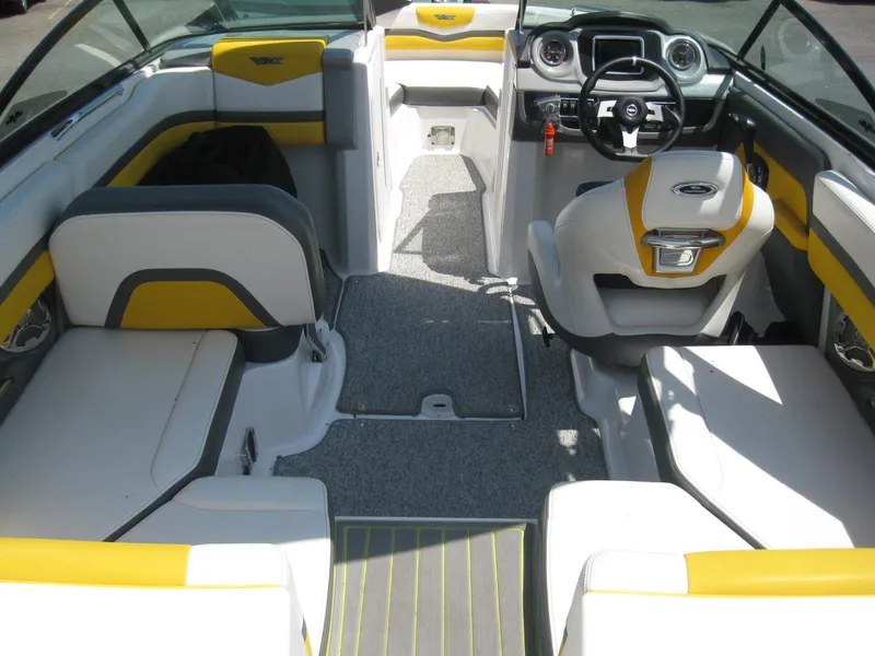 Slide: The Image of 2015 Chaparral 203 Vortex VRX boat interior with yellow and white seating. - 8