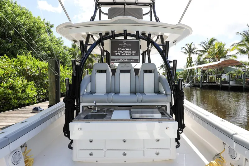 Slide: The Image of 2020 Regulator 41 boat interior with seating and storage drawers. - 12
