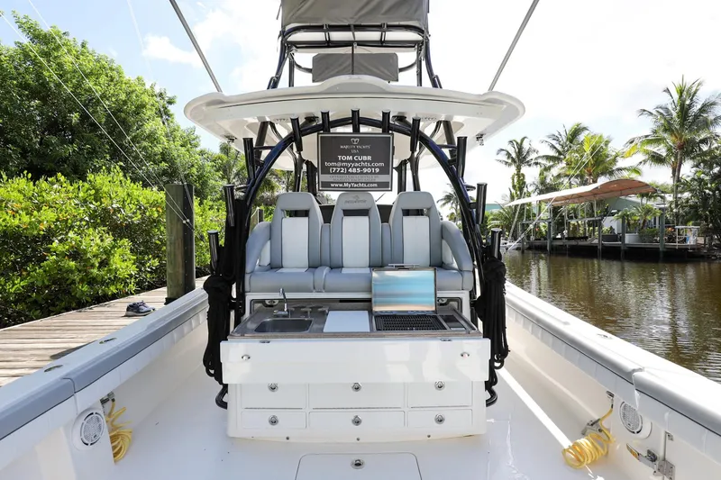 Slide: The Image of 2020 Regulator 41 boat interior with seating and workstation. - 13