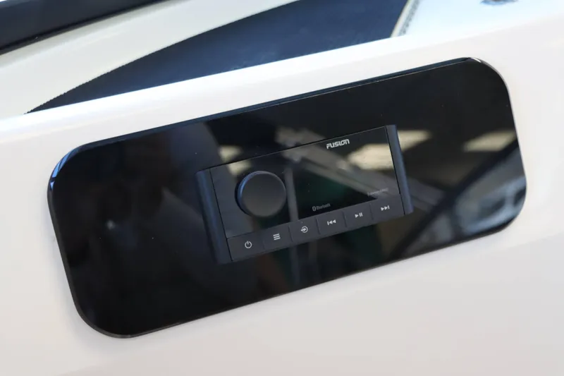 Slide: The Image of Fusion audio system on 2025 Sea Ray 250SDX boat dashboard. - 11