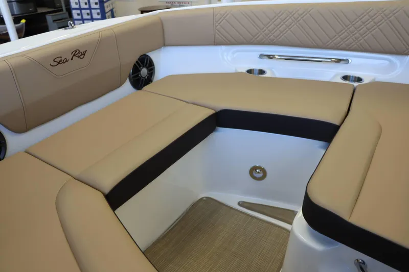 Slide: The Image of Luxurious seating area on 2025 Sea Ray 250SDX boat with tan upholstery. - 14