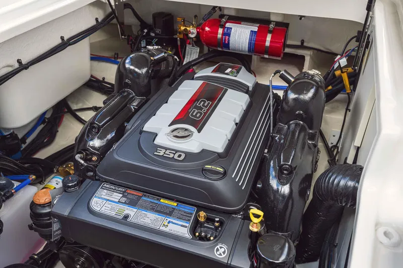 Slide: The Image of 2025 Sea Ray 250SDX engine compartment with Mercury 6.2L 350 HP engine. - 37