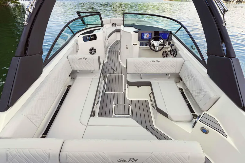 Slide: The Image of Luxurious 2025 Sea Ray 250SDX boat interior with elegant seating and modern dashboard. - 45