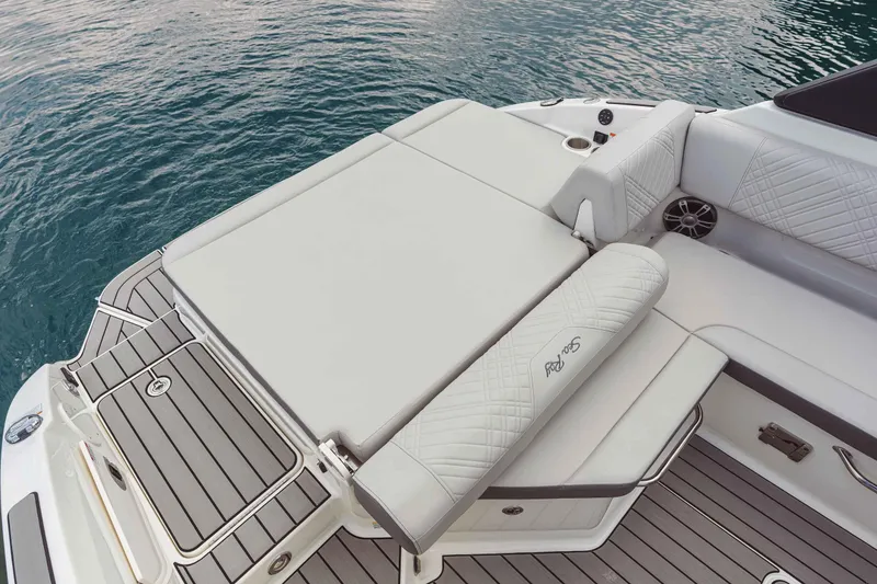 Slide: The Image of 2025 Sea Ray 250SDX boat with luxurious seating and sleek deck design. - 46
