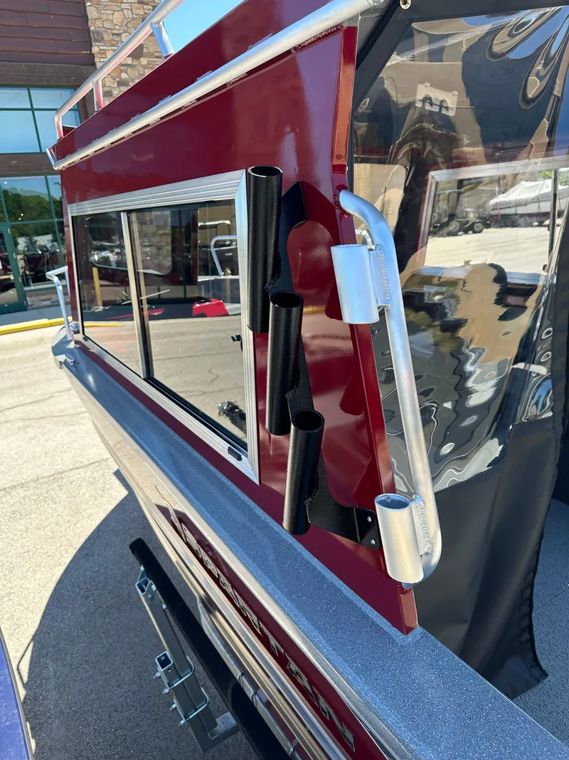 Slide: The Image of 2024 Spartan 220 Maximus boat with red and silver detailing. - 26